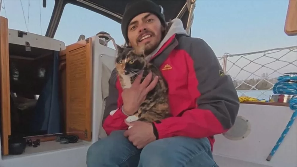 WATCH: Man facing risk of paralysis quits job, sails with cat