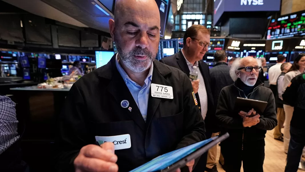 Dow closes down 800 points as bond sell-off rattles markets