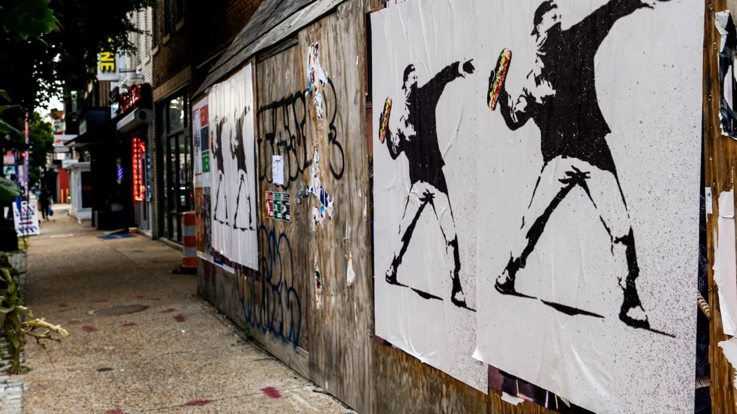 The man who threw a sandwich at a federal agent says it was a protest