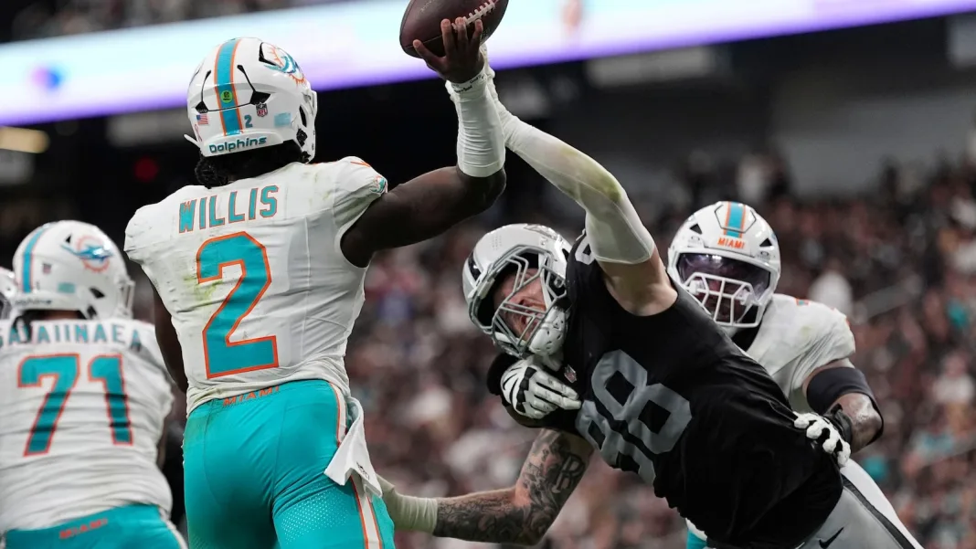 For young Dolphins and first-year coach, shaky opener is part of the rebuilding process